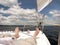 Bare foot of a man who is lying on the deck of the yacht