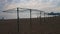 Bare frames of beach umbrellas on a winter beach