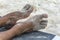 Bare human feet in beach sand