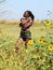 Bare top black woman outdoors green grass