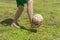 Barefoot amateur soccer player