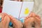 Barefoot children reading a story