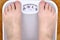 Barefoot person on the scale