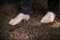 barefoot of woman walking in the nature on clay balls