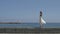 Barefooted Woman Walking On The Pier