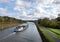 barge in canal between brussels and charleroi on sunny day in autumn