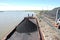 Barge with coal at river port Kolyma