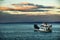 Barge or ferry on a cloudy evening