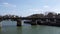 Barge trafic under Pont des Arts bridge on the Seine river - Paris