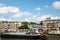 Barges anchored in the marina in the city center, water apartments, London