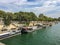 Barges and houseboats along the Right Bank of the Seine River, Paris France