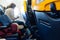 Bari, Italy - March 8, 2019: Notice of fastening the seat belt on the back of an airplane seat