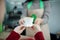 Barista in apron in coffee shop give just brewed fresh coffee to customer