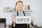 Barista cafe coffee staff hand holding shop Opening sign banner, Restaurant reopen after Covid lockdown concept