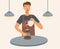 Barista male making coffee isolated flat cartoon character. Flat vector concept. A young man in an apron works in a bar