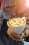 Barista pouring latte froth make coffee latte art