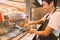 Barista prepare a coffee for extract in coffee machine.