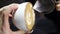 Barista prepares coffee in a cup. Cappuccino with milk. Businessman morning
