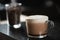 Barista\\\'s Hand Holds Mocha Coffee in a Glass Cup