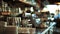 The baristas domain softly blurred and bathed in warm light showcasing shiny coffee equipment and orderly rows of
