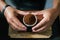 Baristas prepare hot coffee beans in cup pot. to make coffee for steam. Coffee shop concept. in cafe shop for drink,small business