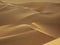 Barkhans in the desert, background of sand dunes