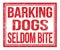 BARKING DOGS SELDOM BITE, text on red grungy stamp sign