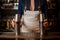 Barmaid with a beautiful deep neckline holding shakers