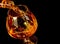 Barman pouring snifter of brandy in elegant typical cognac glass on black background