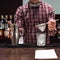 Barman show. Bartender is making cocktail at night club.