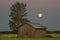 Barn in Farmfield by Tree with a Full Moon