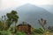 Barn and foggy mountains in Nepal