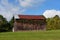 Barn Has Small Repair to Rusting Roof