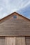 Barn roof with blue sky background