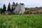 a barn with wheel fence