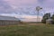 Barn, Windmill and Grain Bin on the Prairie