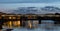 Barnes Railway Bridge in west London, a Grade II listed structure, photographed during blue hour on a cold, clear winter`s evening