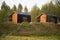 Barnhouse style house. House in the bosom of nature. Greenery and trees