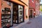 Barolo street with winery and typical shops in summer in Italy