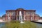 Baroque castle called Bruchsal Palace with fountain on sunny day