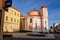 Baroque Chapel of Saint Florian and fountain with sundial, Narrow picturesque street, Church at the pedestrian zone in Kladno in s