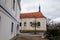 Baroque church of St. Mary Magdalene with clock tower at main Masaryk Square in city centre, spa resort in winter day, Lazne