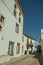 Baroque facade of old houses with whitewashed wall in Marvao