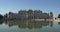 Baroque palace Belvedere with its reflection in water