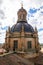 Baroque style bell tower and dome of La Clerecia building in Salamanca, Spain