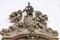 Baroque style sculptures and ornaments on the front facade of a old and historic church