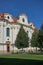 Baroque white benedictine monastery Brevnov with church.