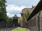 Barracks, fence and watchtower in the former concentration camp. Auschwitz