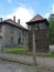 Barracks, fence and watchtower in the former concentration camp. Auschwitz