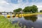 Barrage in Dutch river Vecht with floating barricade